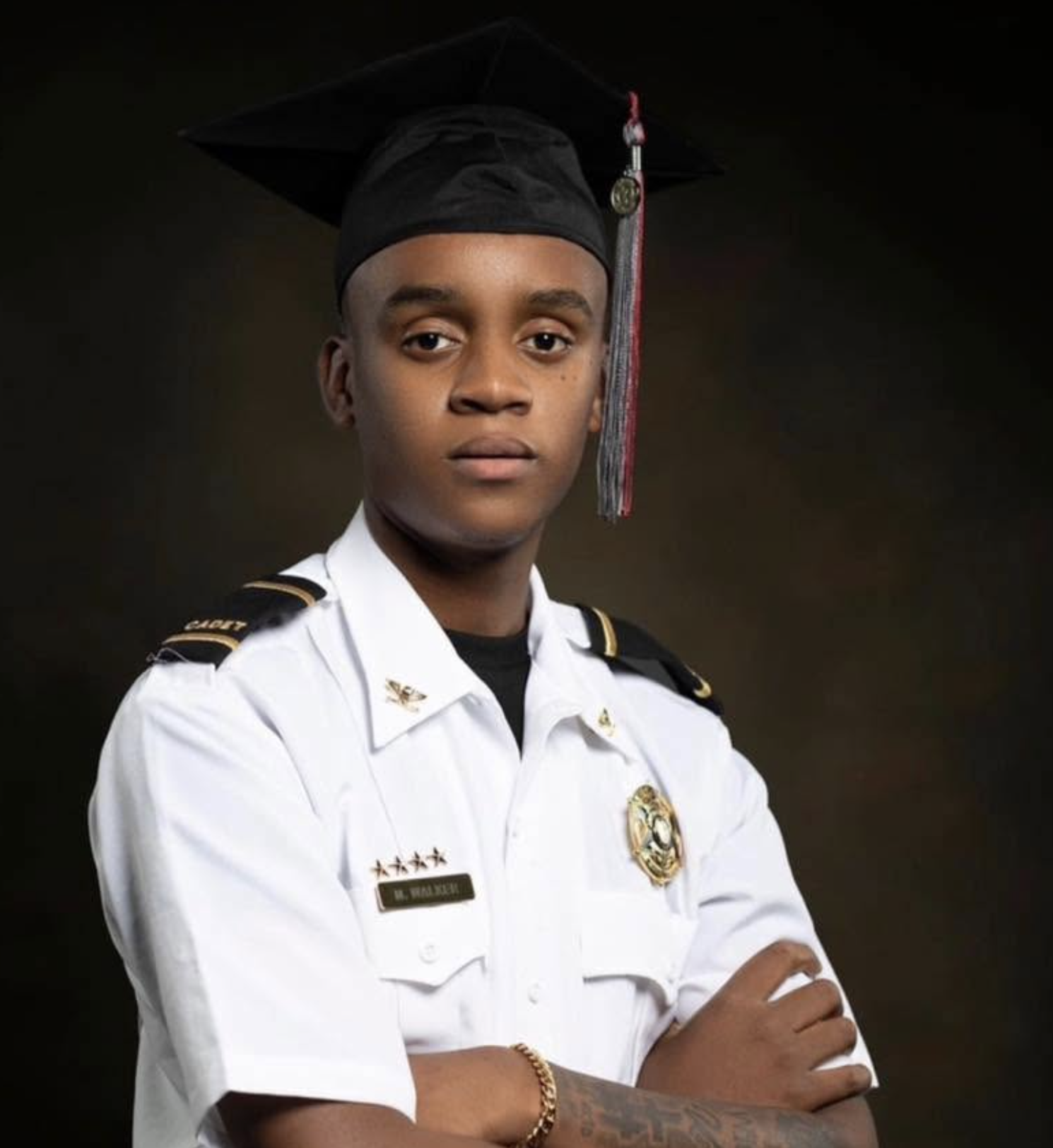 Mikell Walker Jr., pictured in his public-service uniform